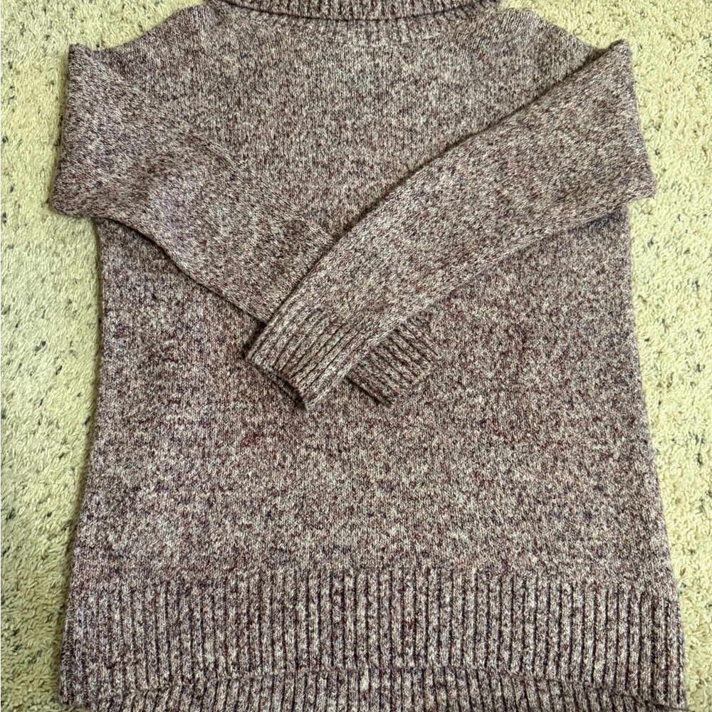 Turtle neck sweater.